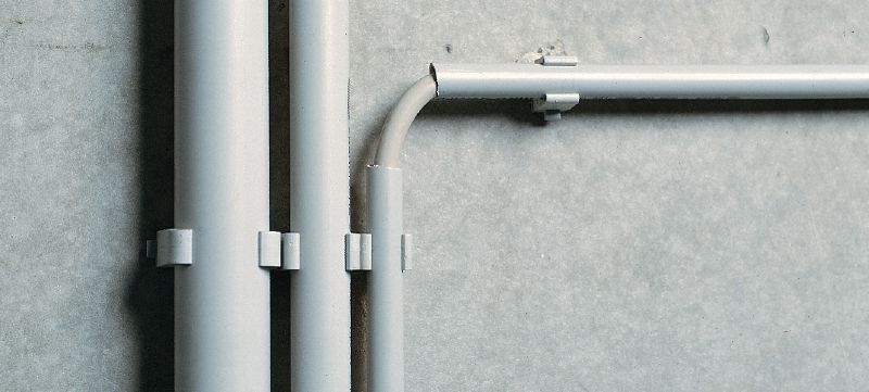 Attache pour câble électrique EKS-SM Attache pour câble électrique (SM) chevillée dans le béton pour fixer des conduits individuels Applications 1
